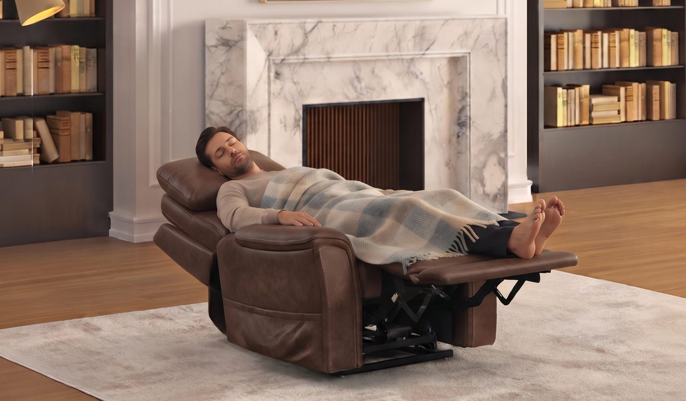 Man resting under a blanket in a reclined brown lift chair with his feet up